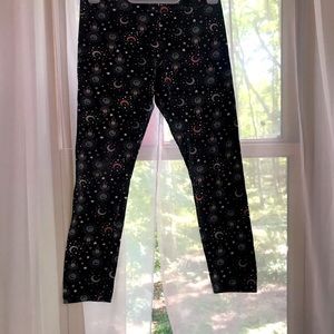 So these pants have moons in and stars and suns  on them and they are for girls
